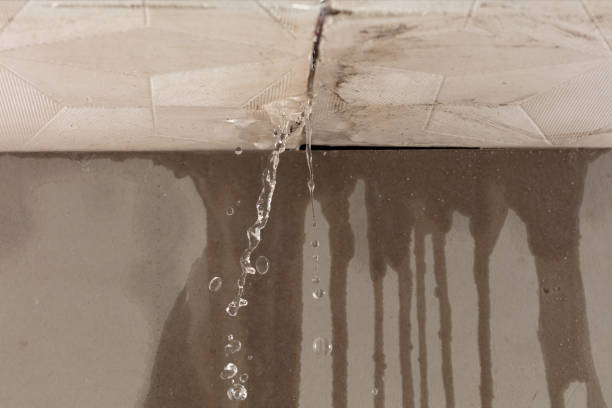 Professional Flood Damage Cleanup technician working in Holladay, TN